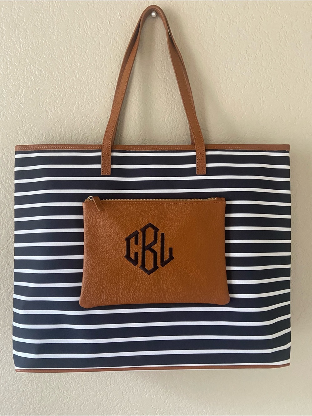 Navy & White Striped Tote with Tan Removable Pouch, monogrammed “CLB”.